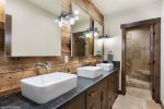 No one will have to fight for sink space in this large bathroom 